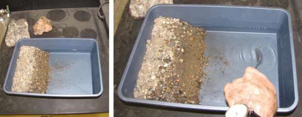 Basin with sediment on one side, water on the other, making a beach