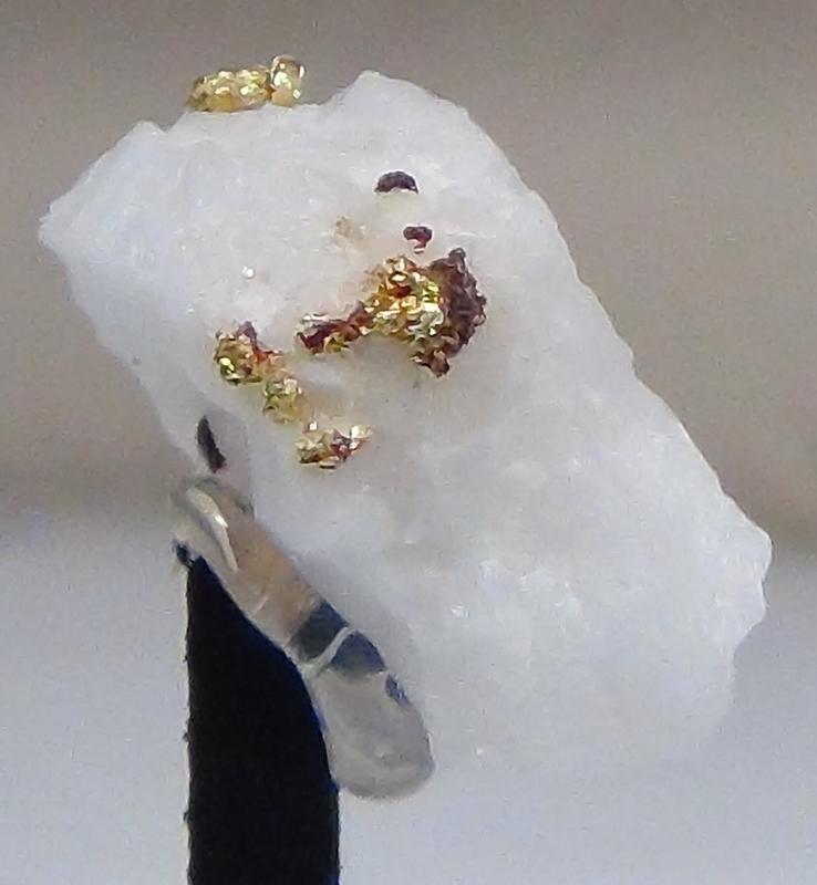 Gold flakes in quartz Harvard Open Pit Mine, California